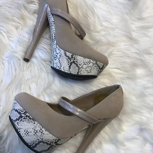 Beige/Nude with snakeskin heels.